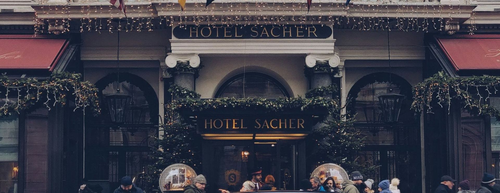 Entrance of the famous Café Sacher in Vienna, known for the original Sachertorte