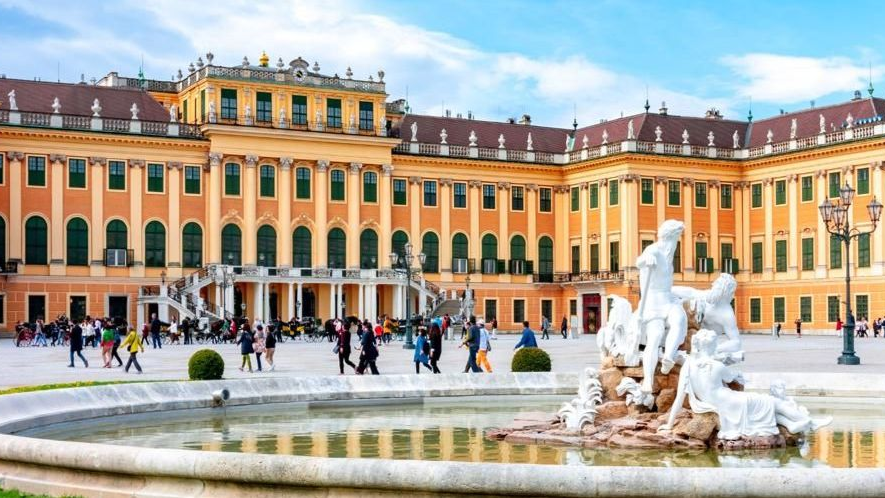 Schönbrunn Palace, the former Habsburg summer residence Schönbrunn Palace in Vienna with Neptune Fountain