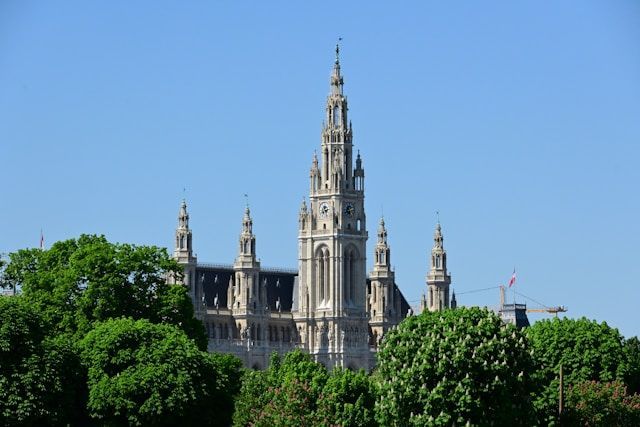 Vienna City Hall (Rathaus) in summer with clear blue sky — iconic landmark featured