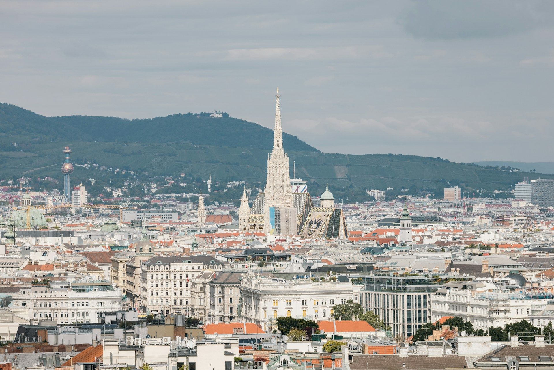 Panoramic view of Vienna city with St. Stephen’s Cathedral and surrounding rooftops
