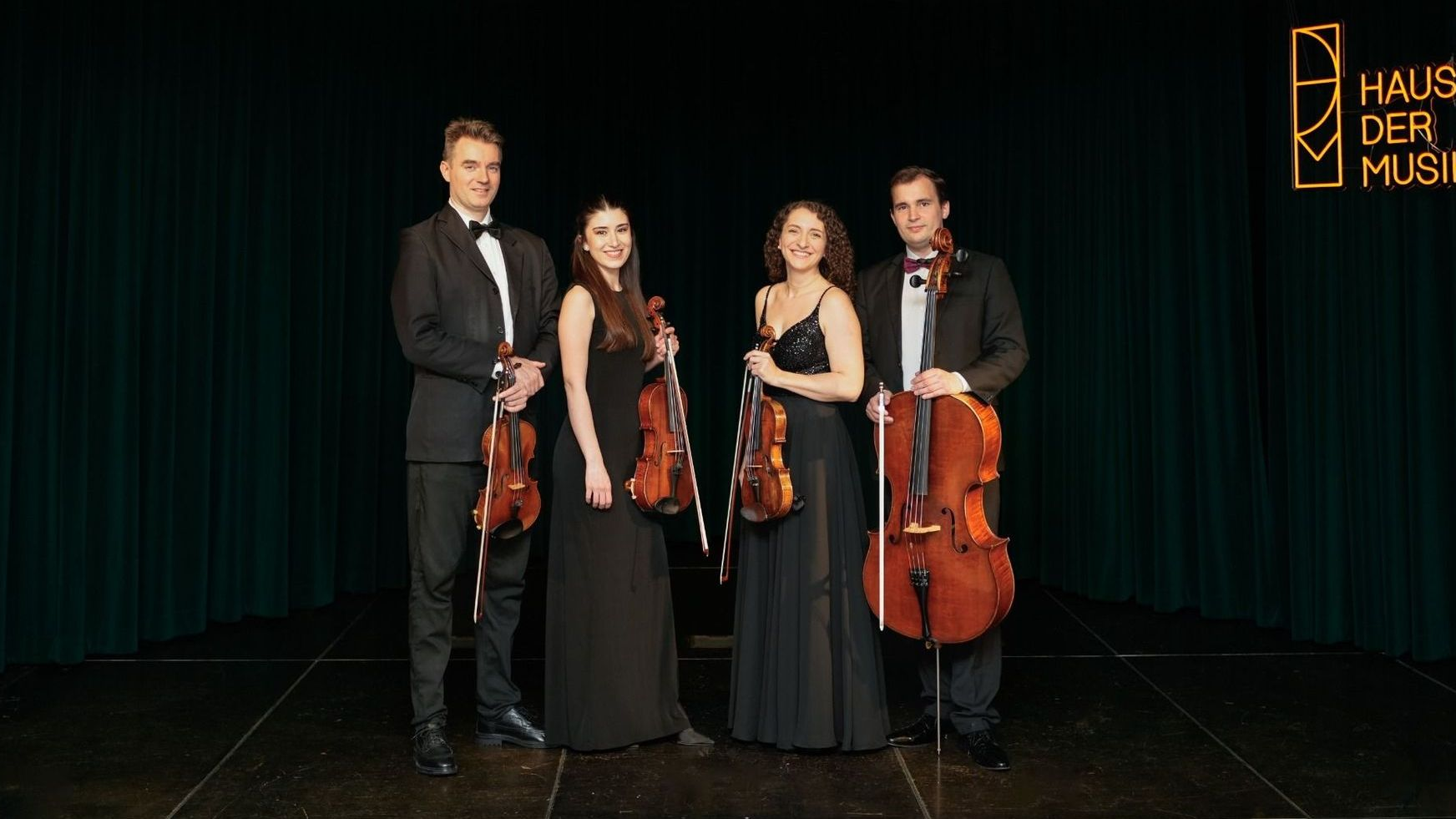Musicians performing at Haus der Musik, Vienna Classical string quartet at Haus der Musik in Vienna