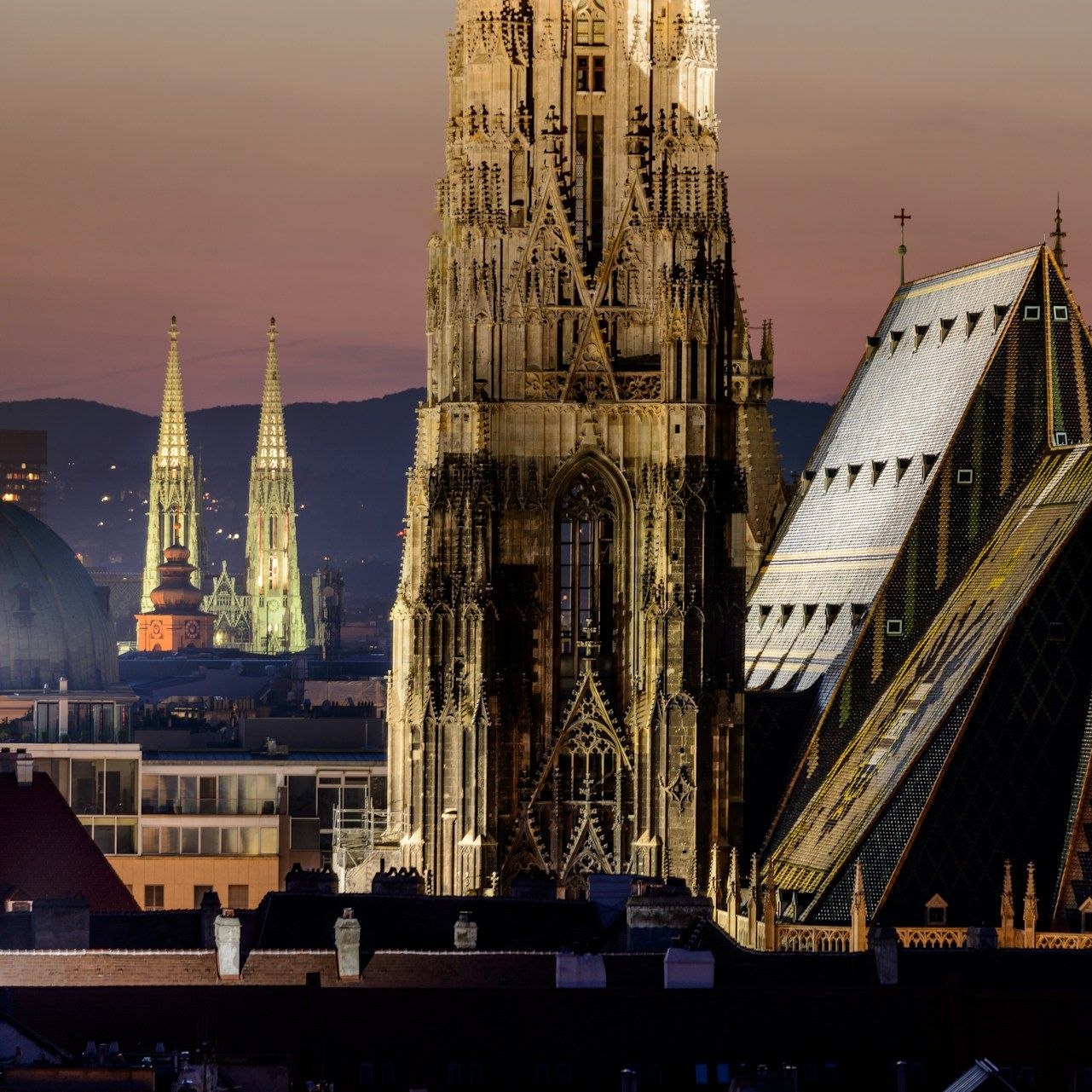 St. Stephen’s Cathedral and Vienna skyline at sunset, a must-see landmarks for first-time visitors.