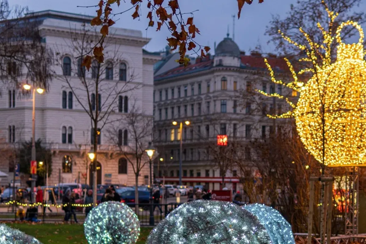 Vienna Rathauspark illuminated with winter lights and decorations—peaceful February evening atmosphere in the city center.