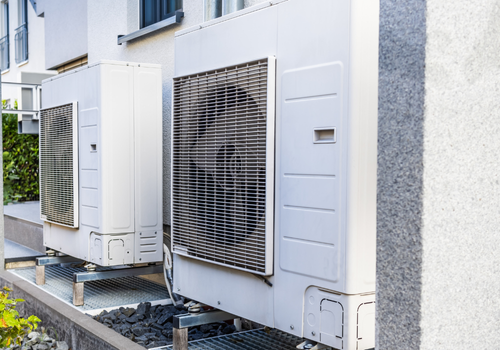 two heat pumps installed outside littleton, co home