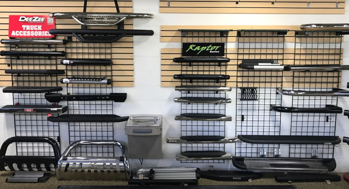 A wall filled with a variety of truck accessories