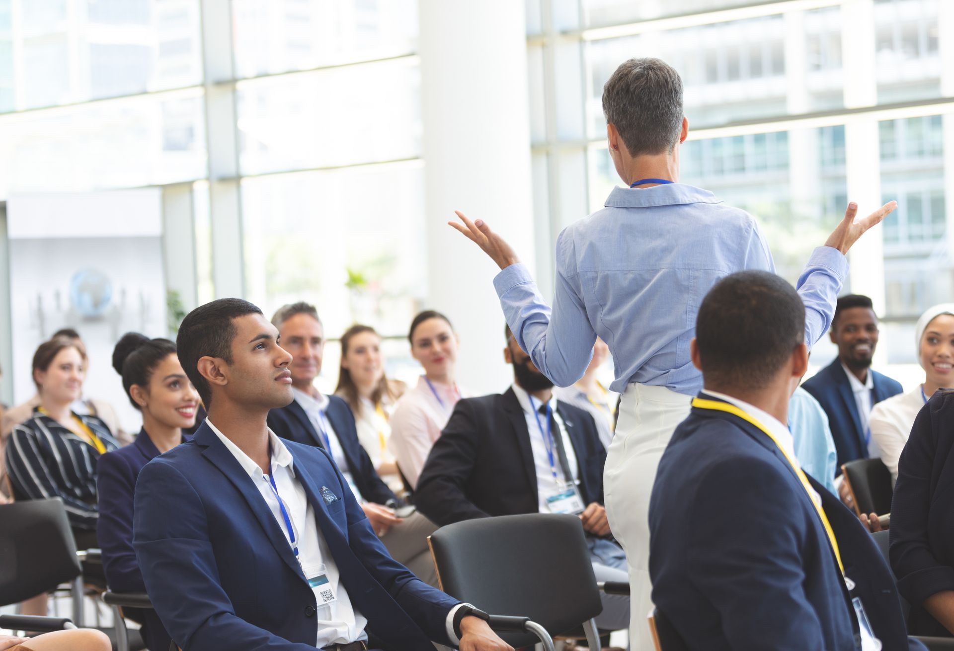 Experienced business leader actively engaged in a coaching discussion