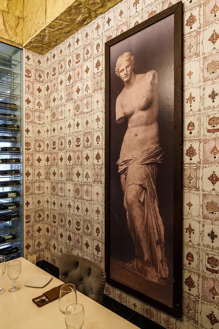 Private dining room with see-through wine wall.