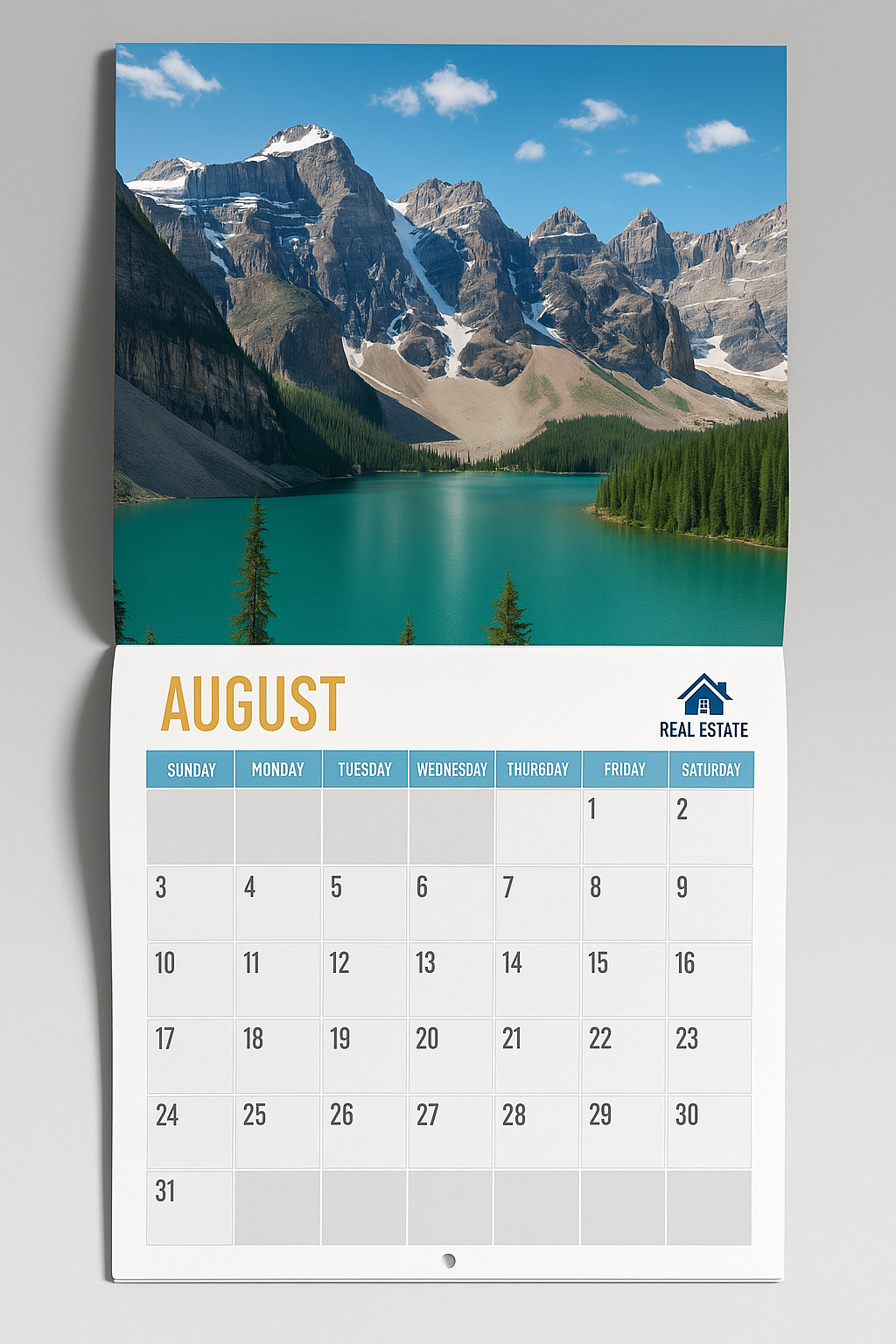 A calendar with a picture of a lake and mountains on it.