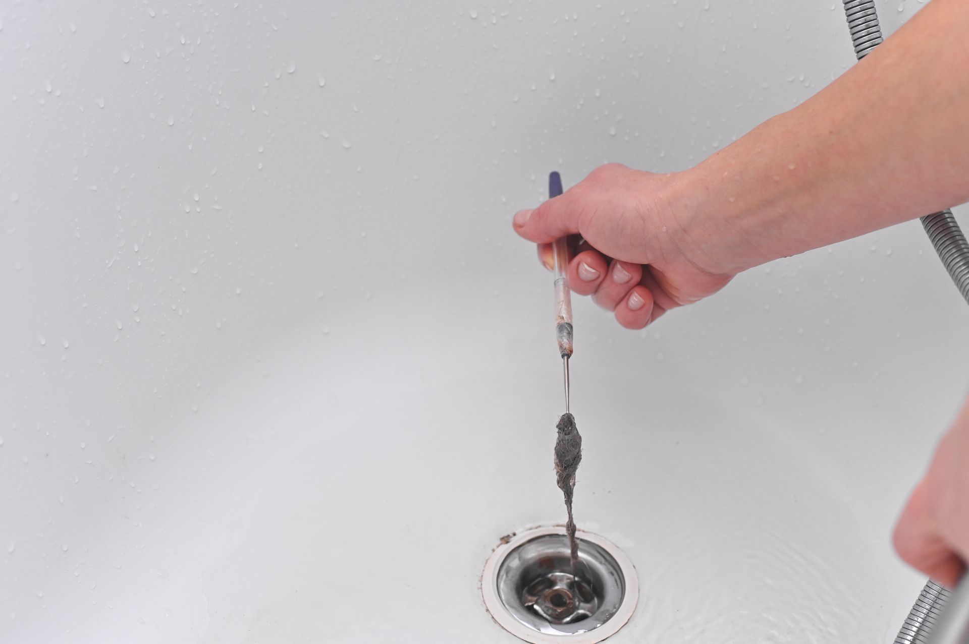 pulling out stopped up drain that's clogged