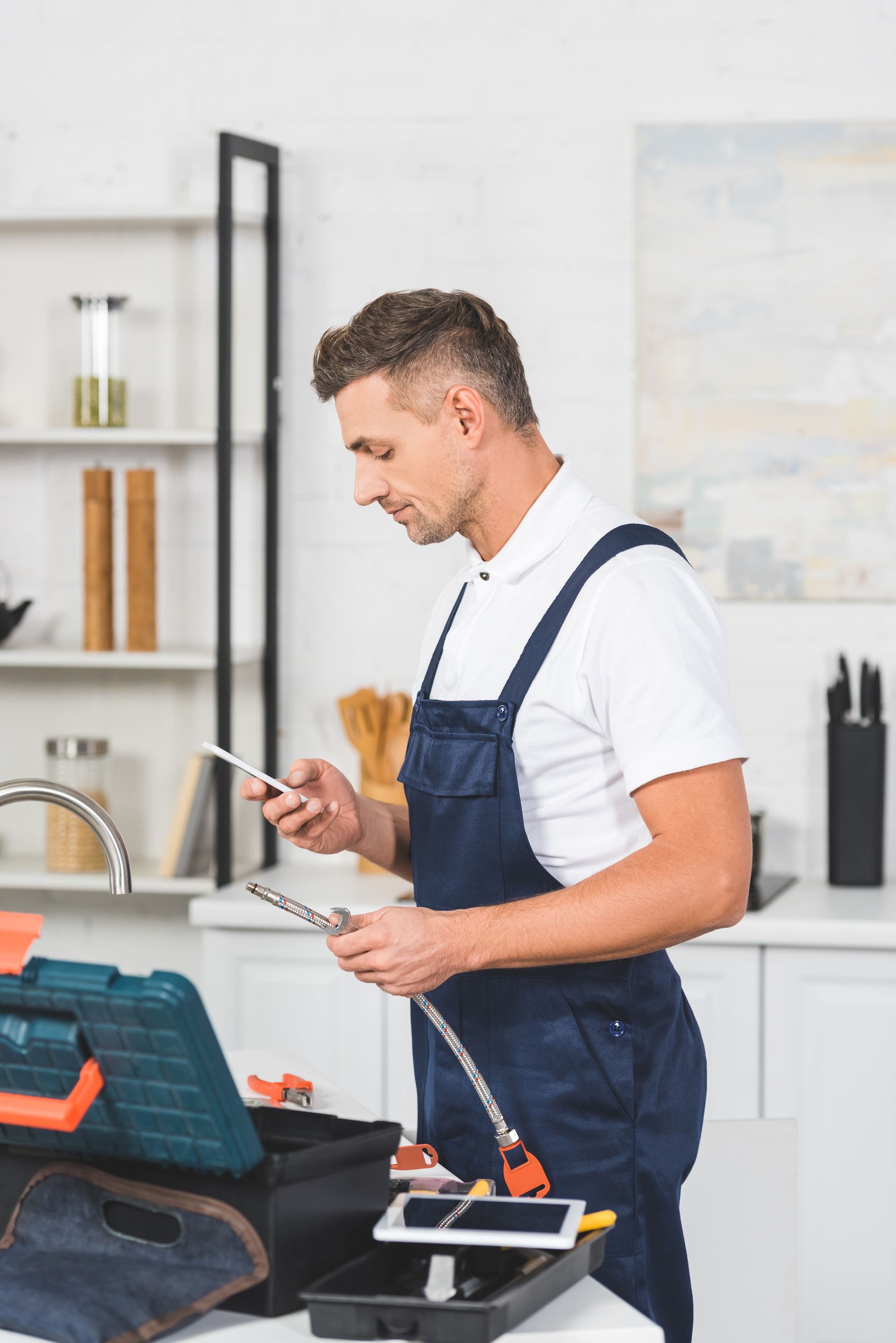 plumber with tools in Wellington fl 