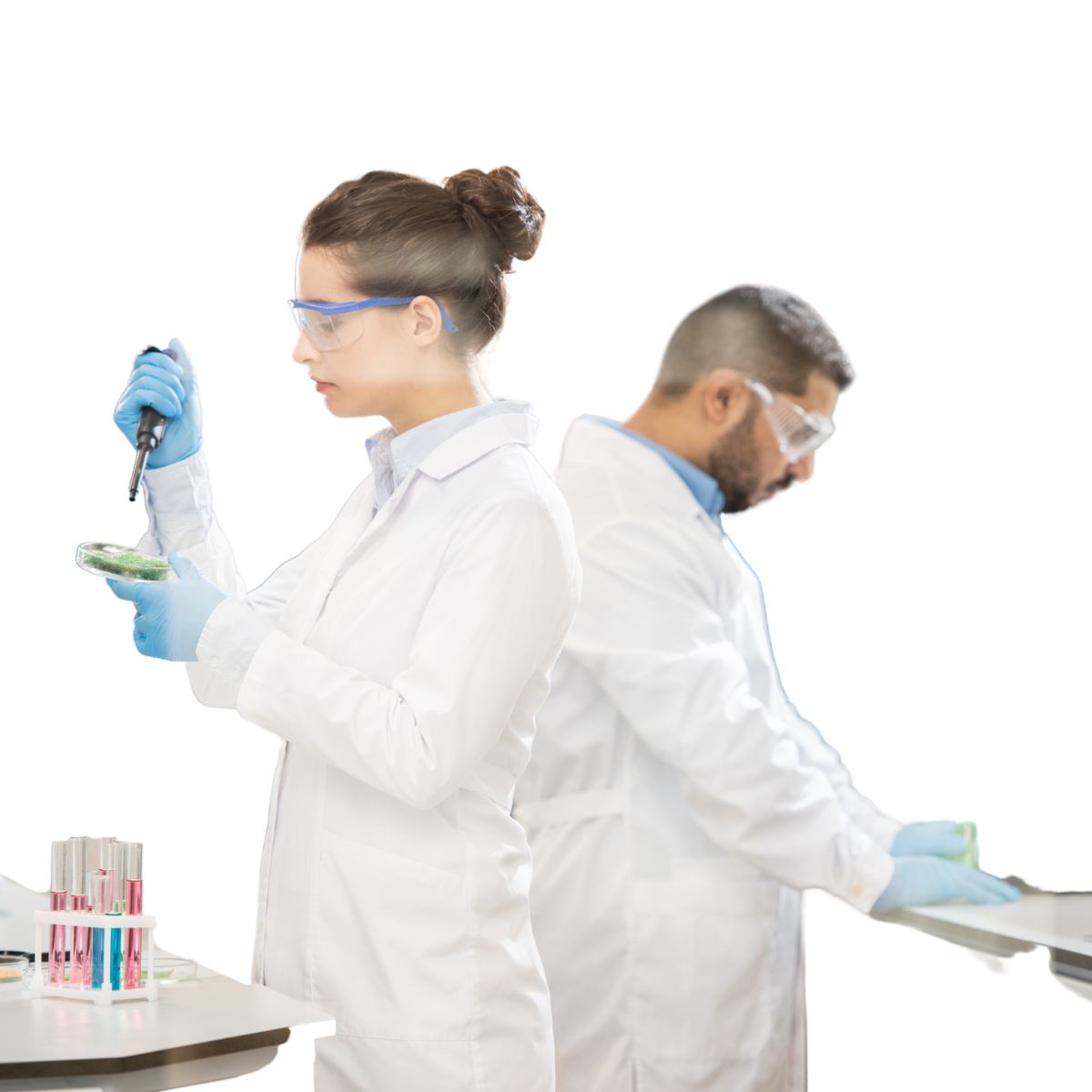 A man and a woman are standing back to back in a lab