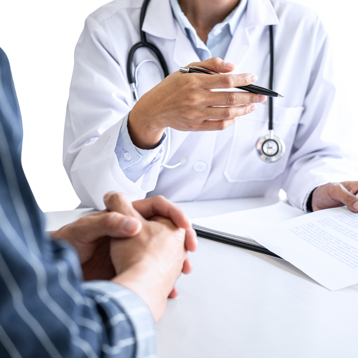 A doctor with a stethoscope is talking to a patient