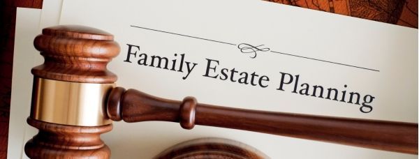 A wooden gavel sitting on top of a document titled Family Estate Planning