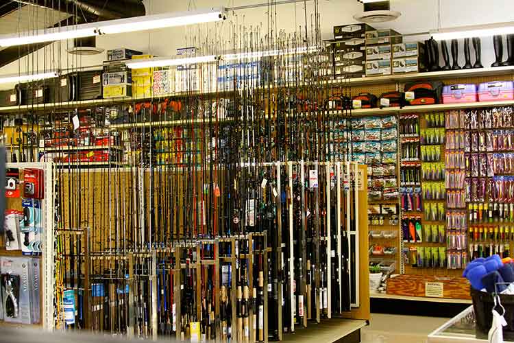 Interior view of Jeffs Sporting Goods fishing pole selection in their extensive fishing department in their San Gabriel store.