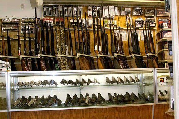 Interior view of Jeffs Sporting Goods Shooting Department with hand guns in the case in  their San Gabriel store.
