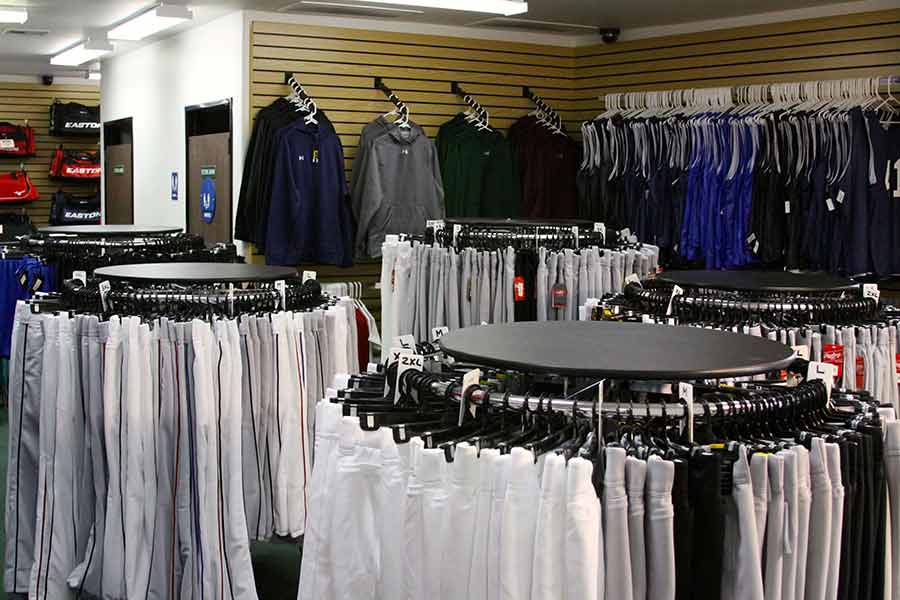 Interior view of Jeffs Sporting Goods Apparel department with baseball, basketball, football coaches shorts  and more in their San Gabriel store.