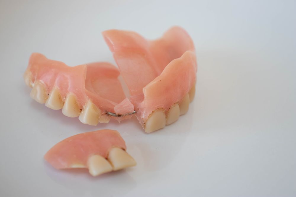 A Dental Technician Painted A Glaze On A Ceramic Crown - Denture Repairs in Moss Vale, NSW