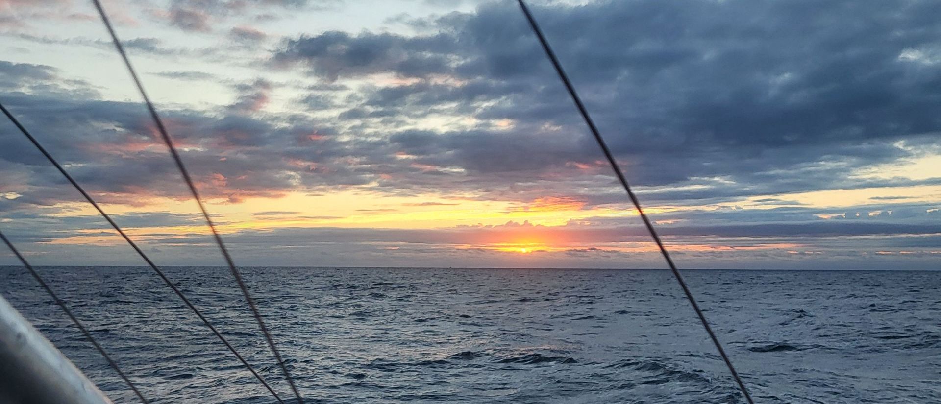 Sunrise over the ocean from 30 Deep Sportfishing vessel