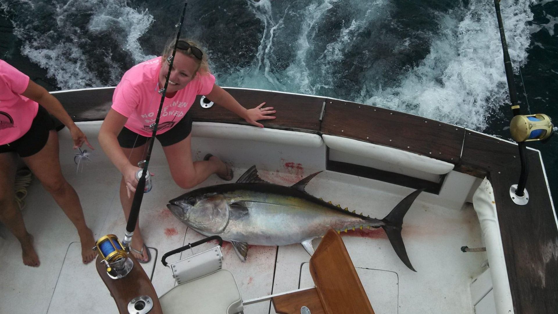 Poor Girls tournament reeling in a blue fin tuna