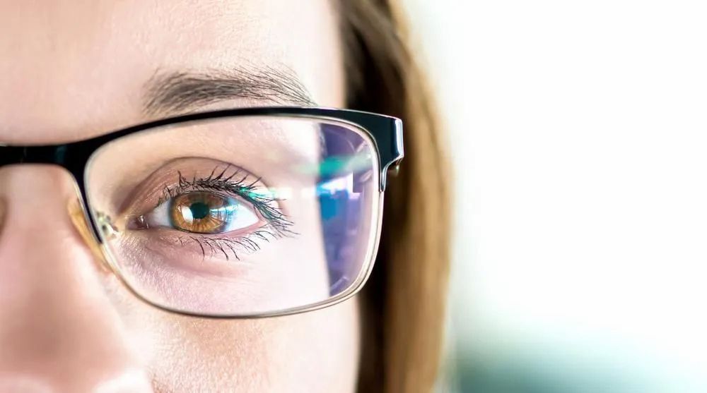 A Close Up of a Woman Wearing Glasses — Michael Chu Optometrist in Cairns North, QLD