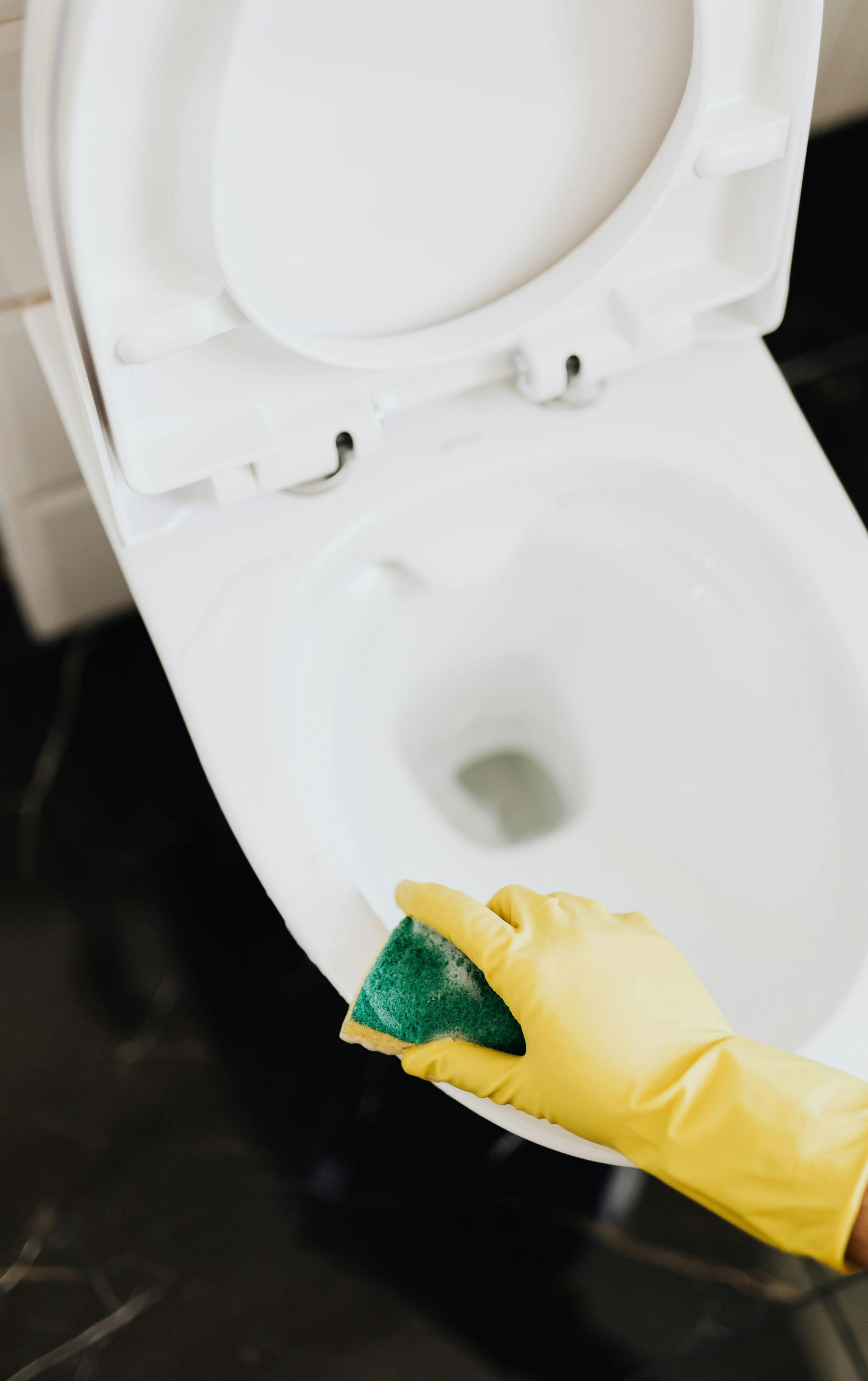 cleaning a toilet