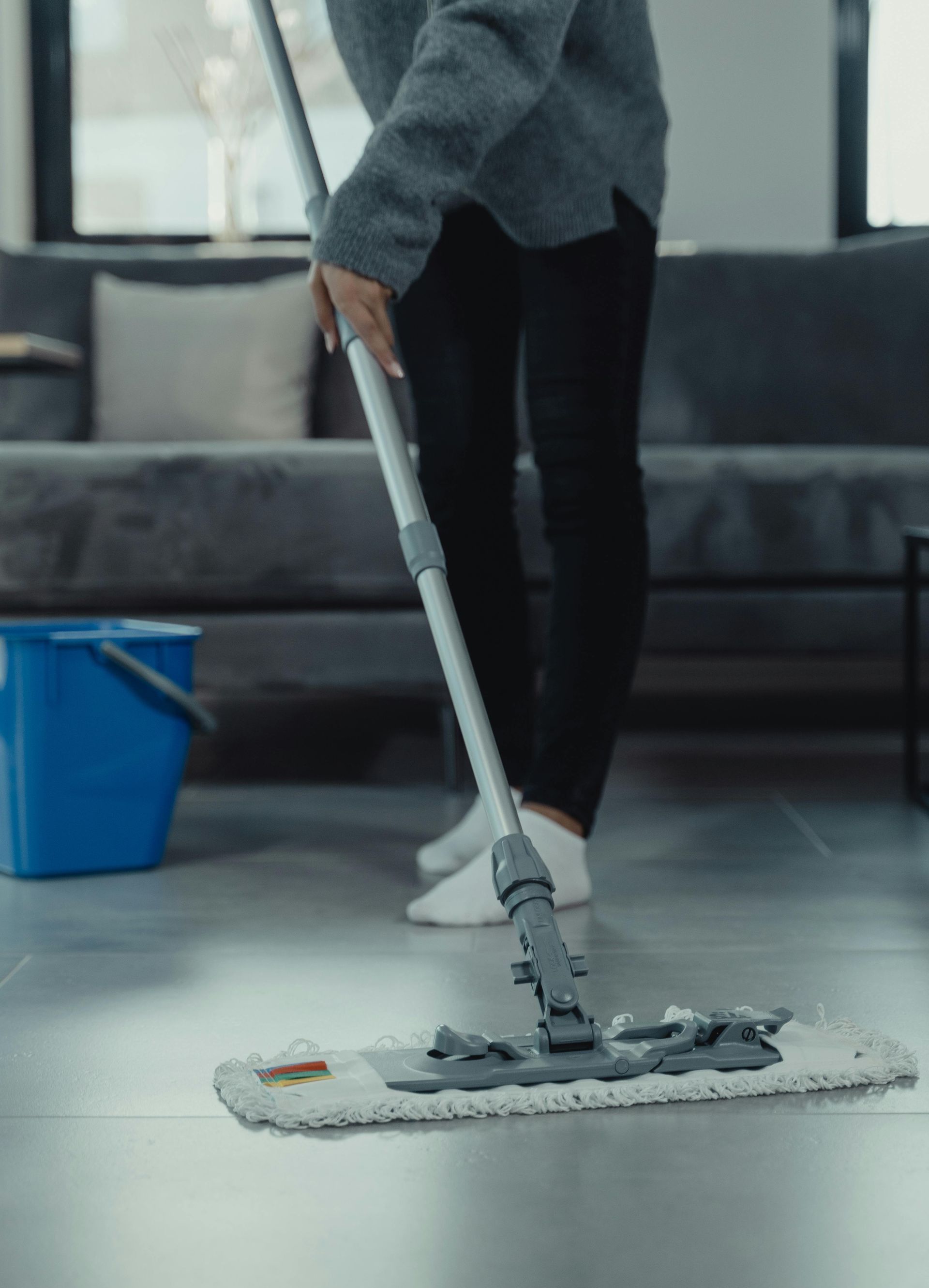 woman mopping a floor