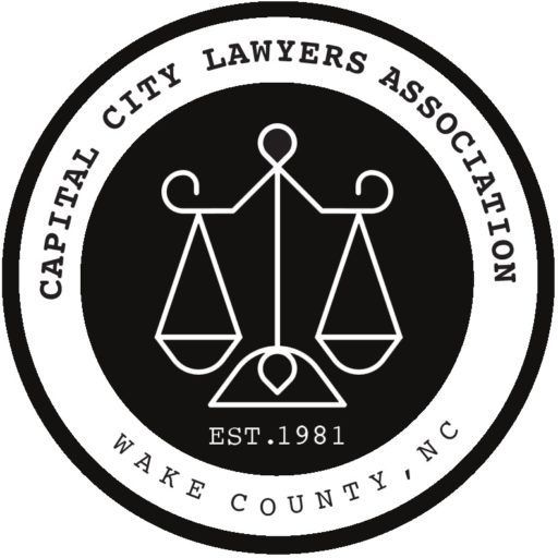 Capital City Lawyers Association logo: Scales of justice in a black circle with text