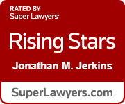 Super Lawyers Rising Star award for Jonathan M. Jerkins. Red background with white text.
