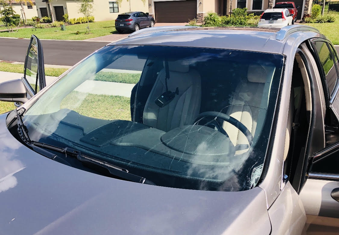 A Car Windshield In Need of Windshield Repair