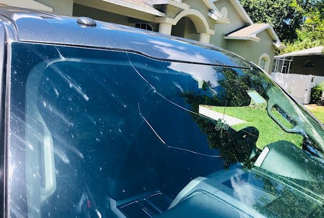 Cracked windshield in need of replacement
