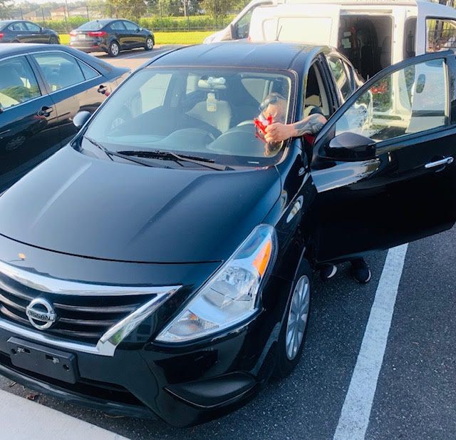 windshield evaluations being performed by certified car technician after auto insurance claim was filed by the vehicle owner
