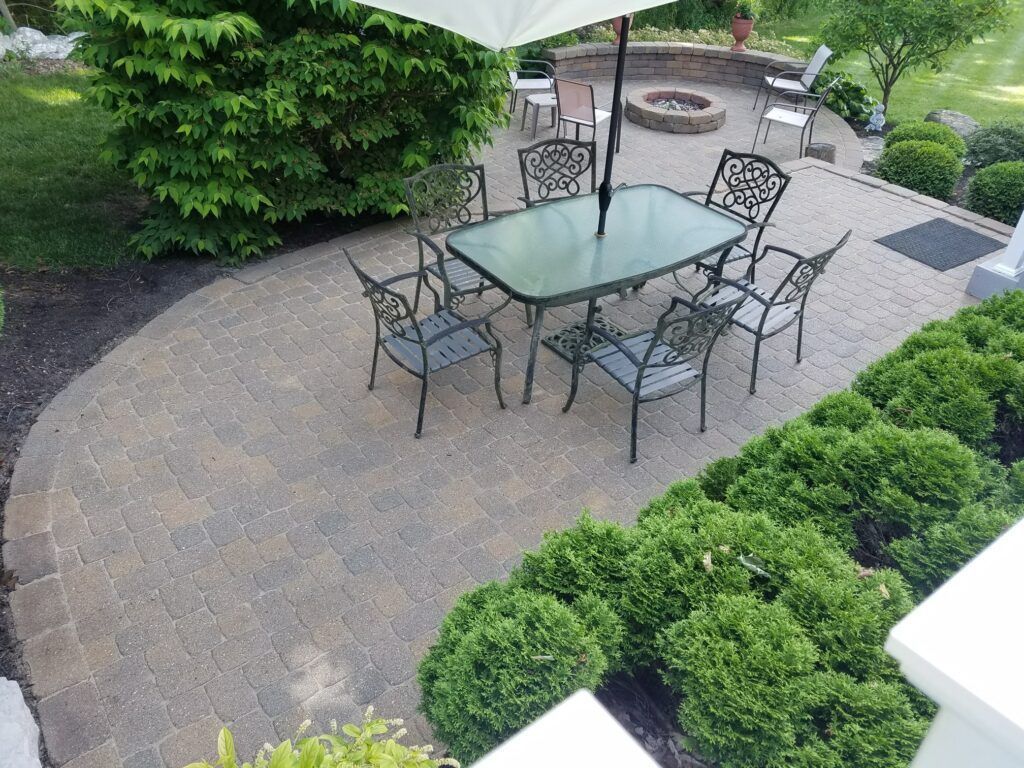 Same paved patio after it has been cleaned and sealed by Hedon Exterior Cleaning