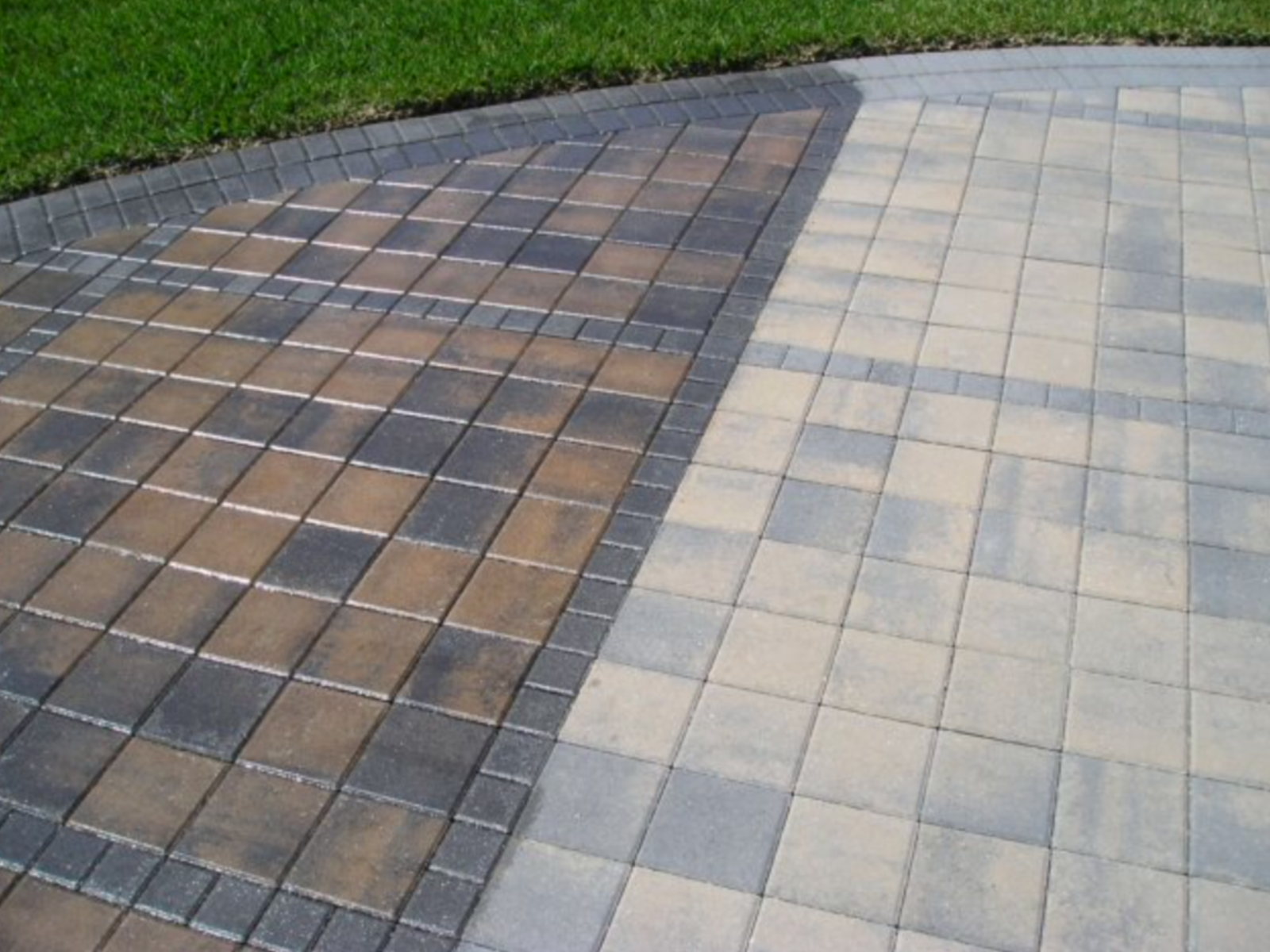 Block paved surface that has been pressure washed and then half sealed to show a before and af