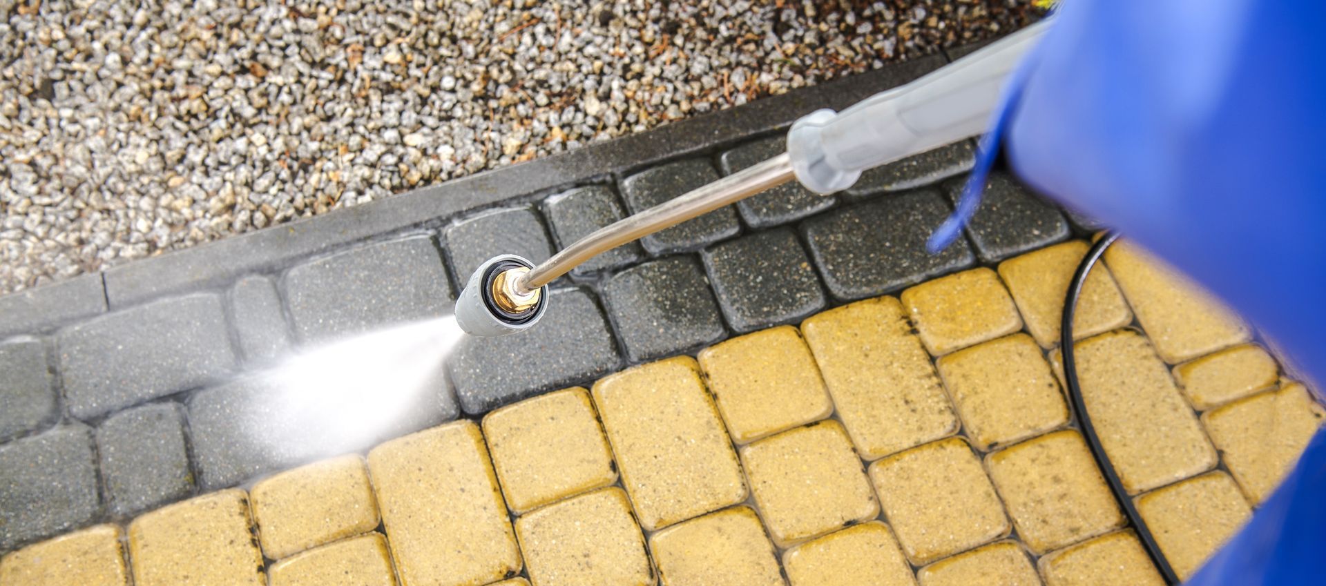 Block paving cleaning: Professional pressure washer cleaning to enhance the appearance of block paved surfaces