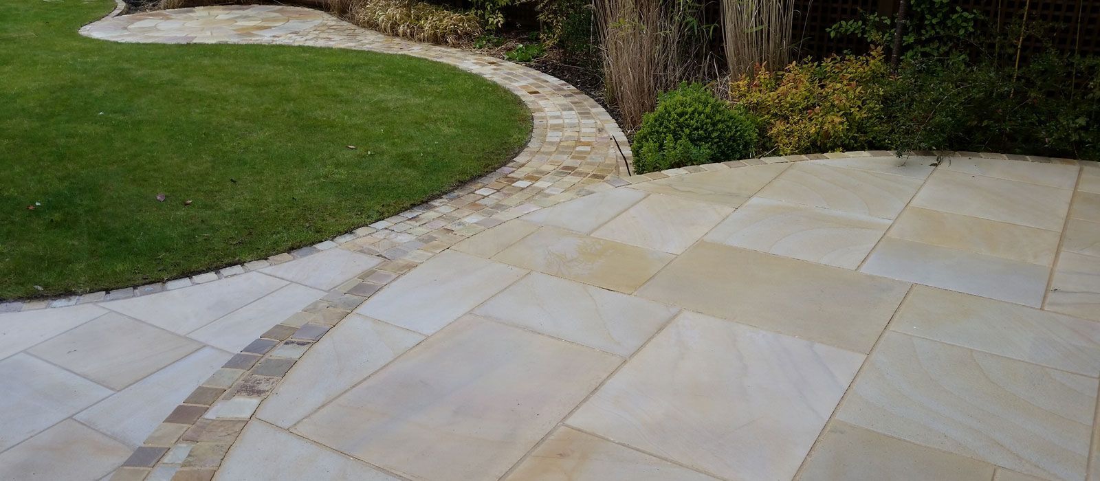 Natural stone patio cleaning service in Hull. Modern garden pressure washed and treated.