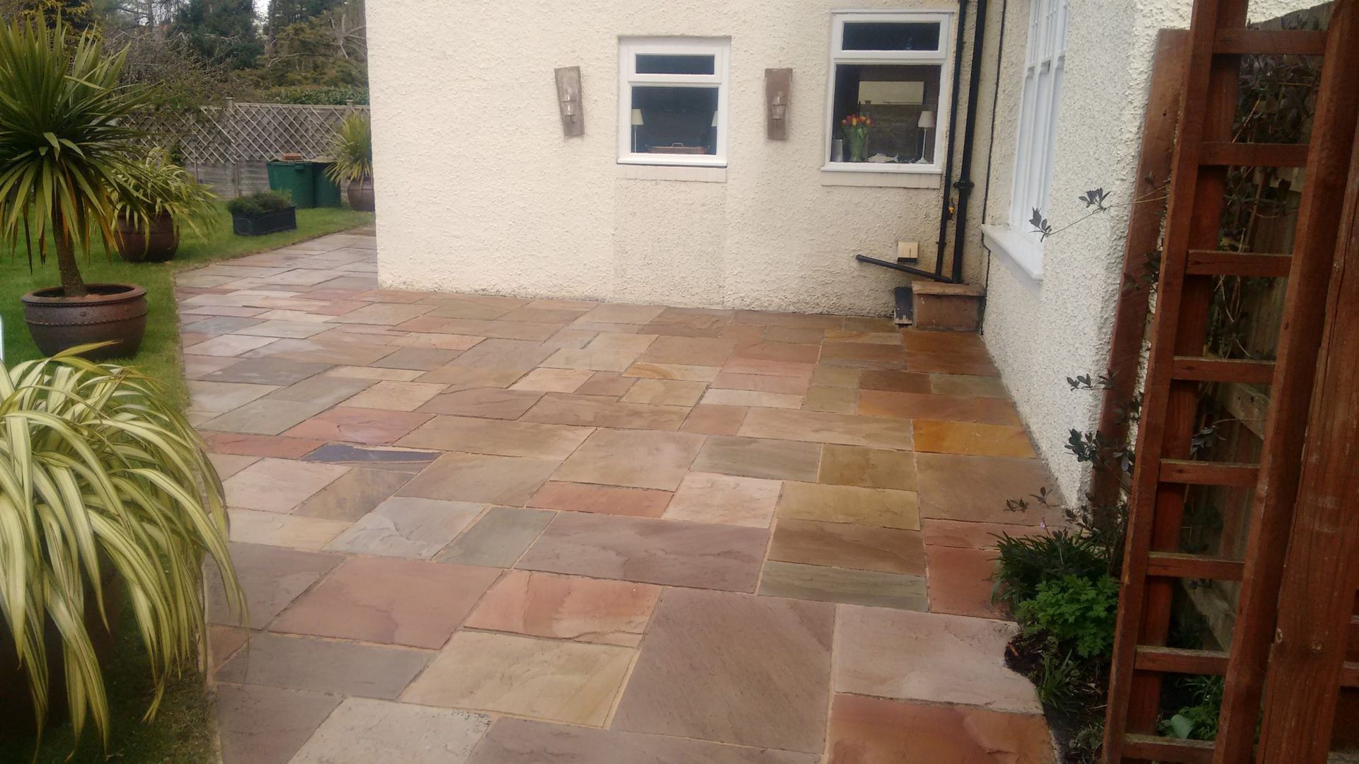 Indian sandstone patio cleaned and sealed by us