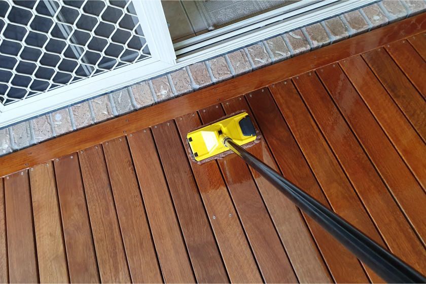 Decking stained using pad