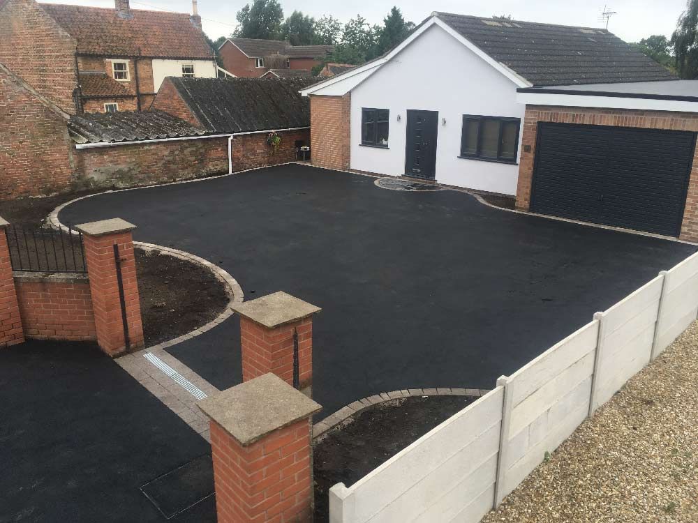 Choosing the ideal driveway surface or cleaning and restoring your old surfaces