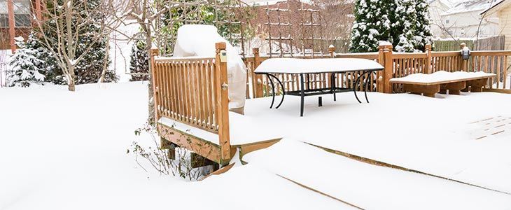 Decking covered in snow at winter time