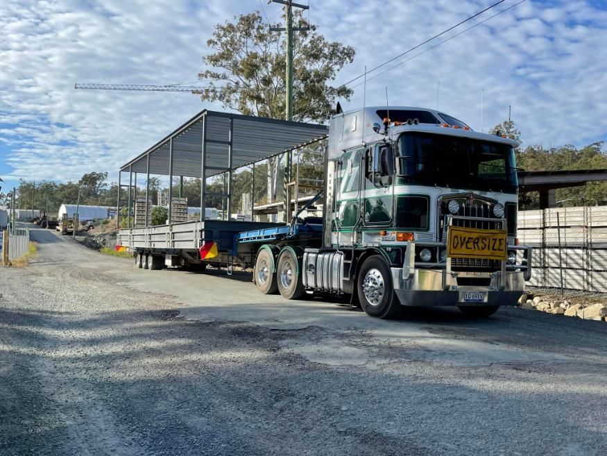 A Semi Truck with A Trailer Attached to It — White's Truck & Machinery Hire in Bouldercombe, QLD