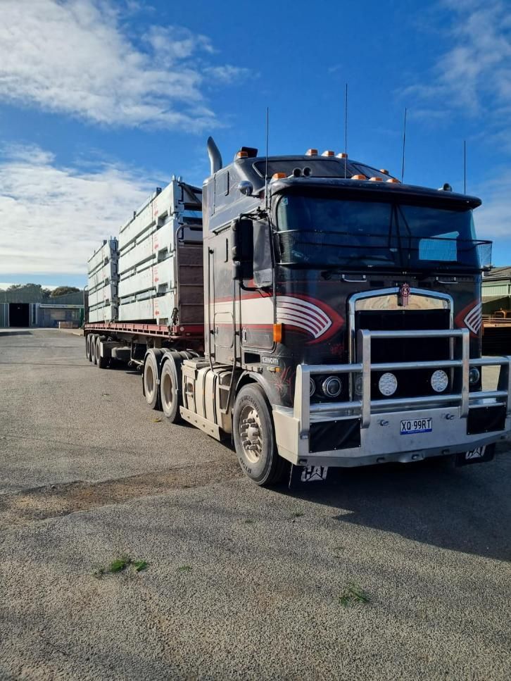 A Large Semi Truck Is Parked in A Parking Lot — White's Truck & Machinery Hire in Bouldercombe, QLD