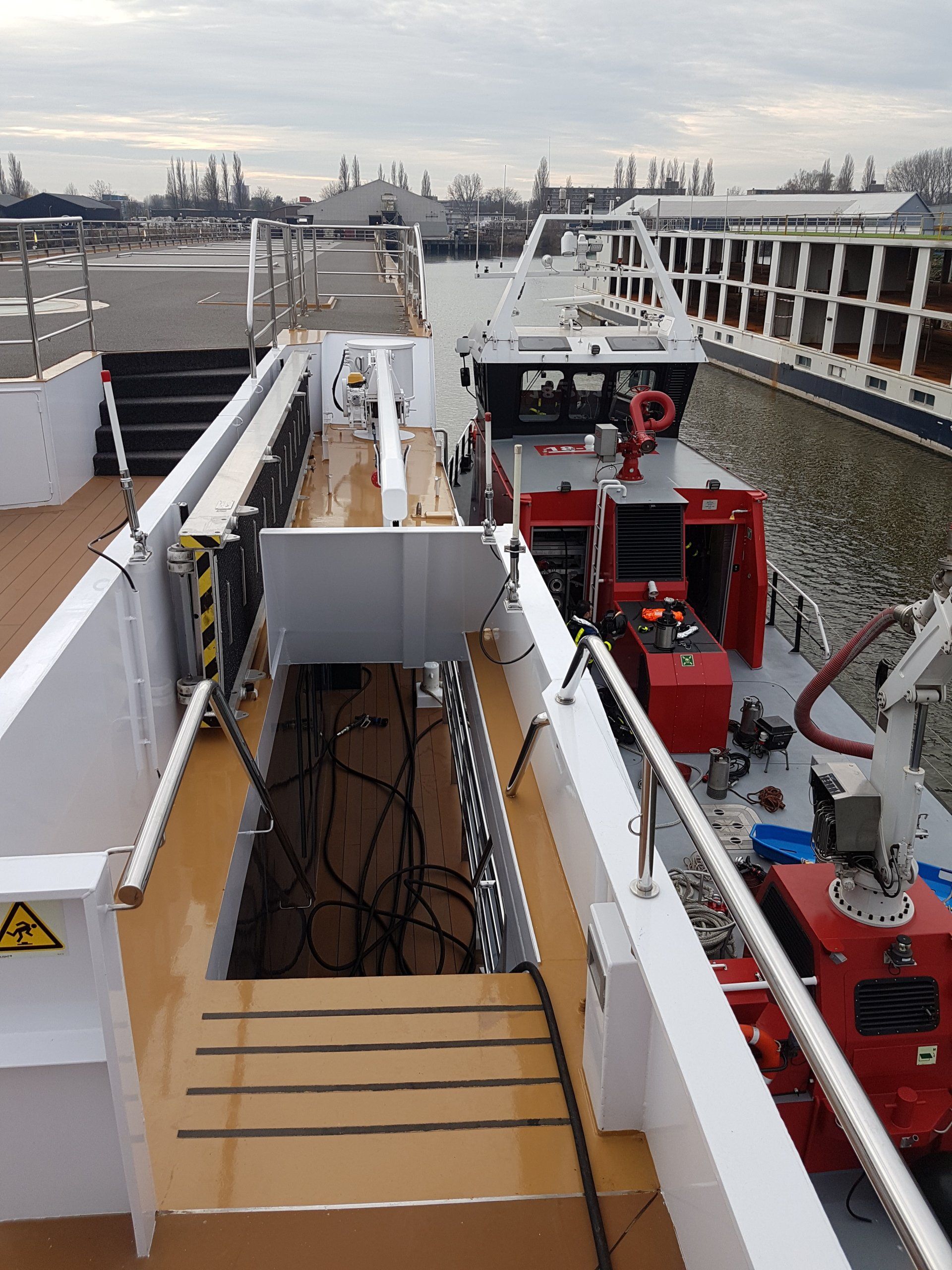 Firefighters conducting firefighting on board of a inland passenger ship. Marine firefighting, shipboard firefighting