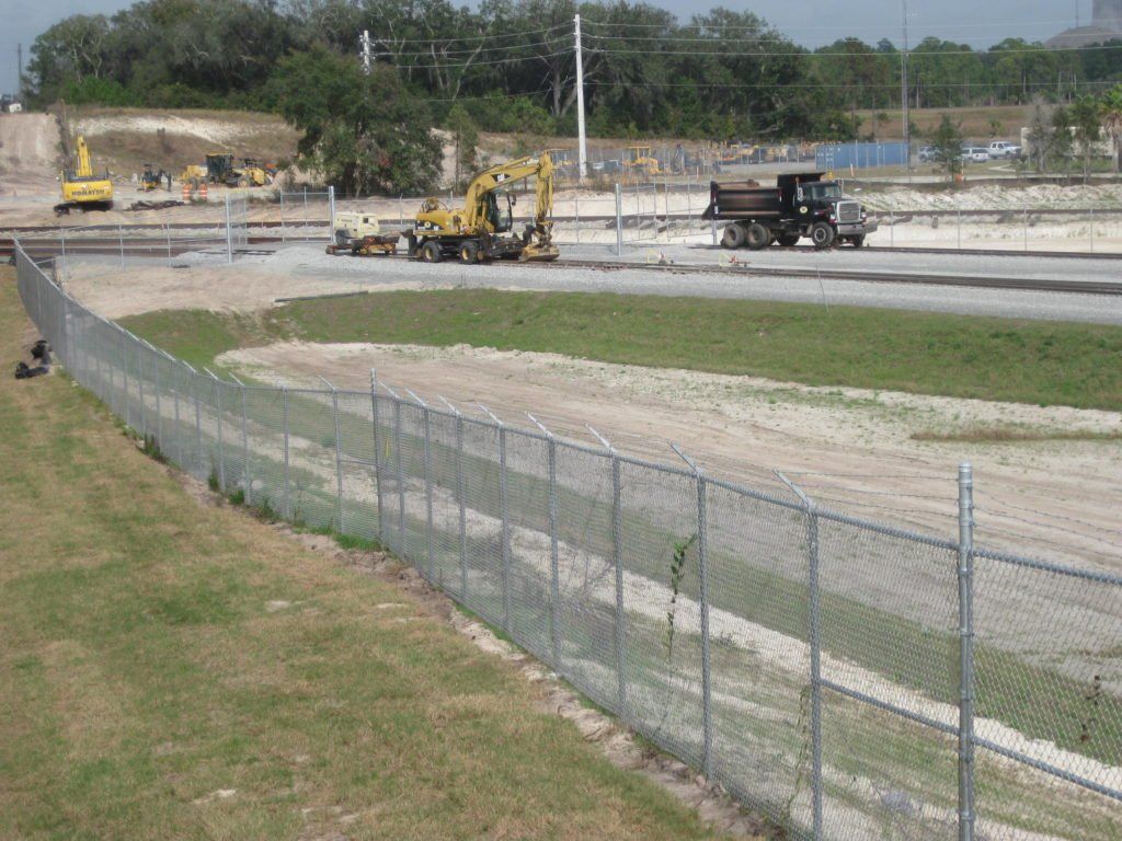 Chain Link Fence With Barb Wire — Jacksonville, FL — Newsom Fence