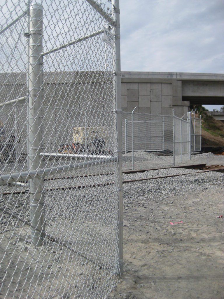 Chain Link Fence With Barb Wire And Swing Gates — Jacksonville, FL — Newsom Fence