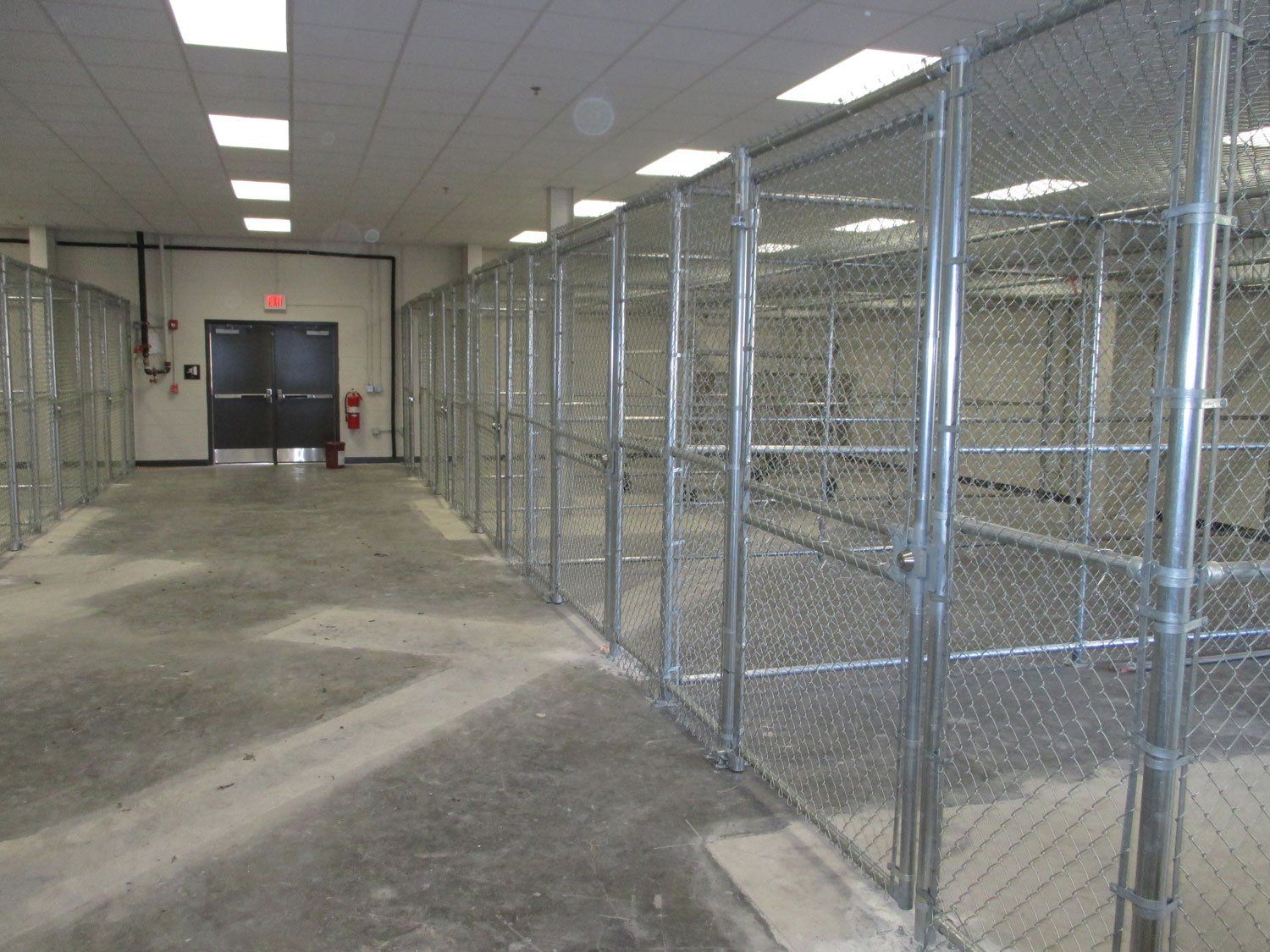 Warehouse Lockable Chain Link Enclosure — Jacksonville, FL — Newsom Fence