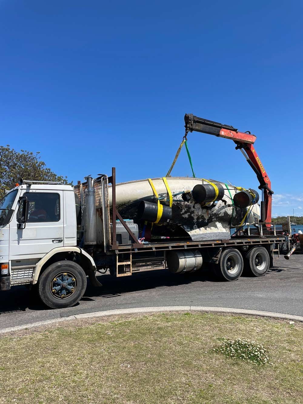 Broken Boat Loading On The Truck — Salvaging in Port Stephens, NSW