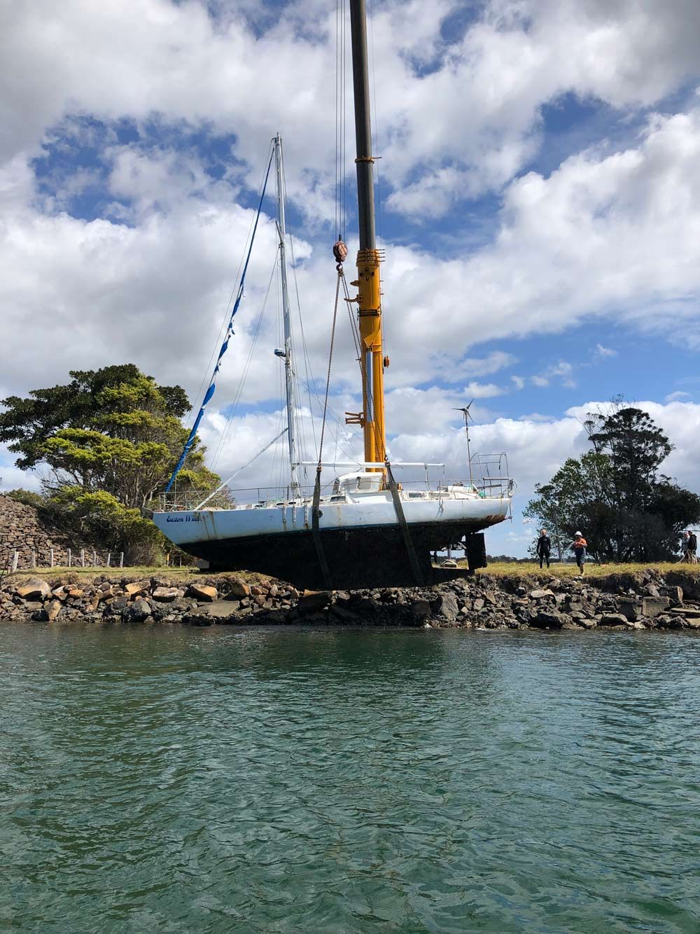 White Sailboat Lifting Up — Salvaging in Port Stephens, NSW