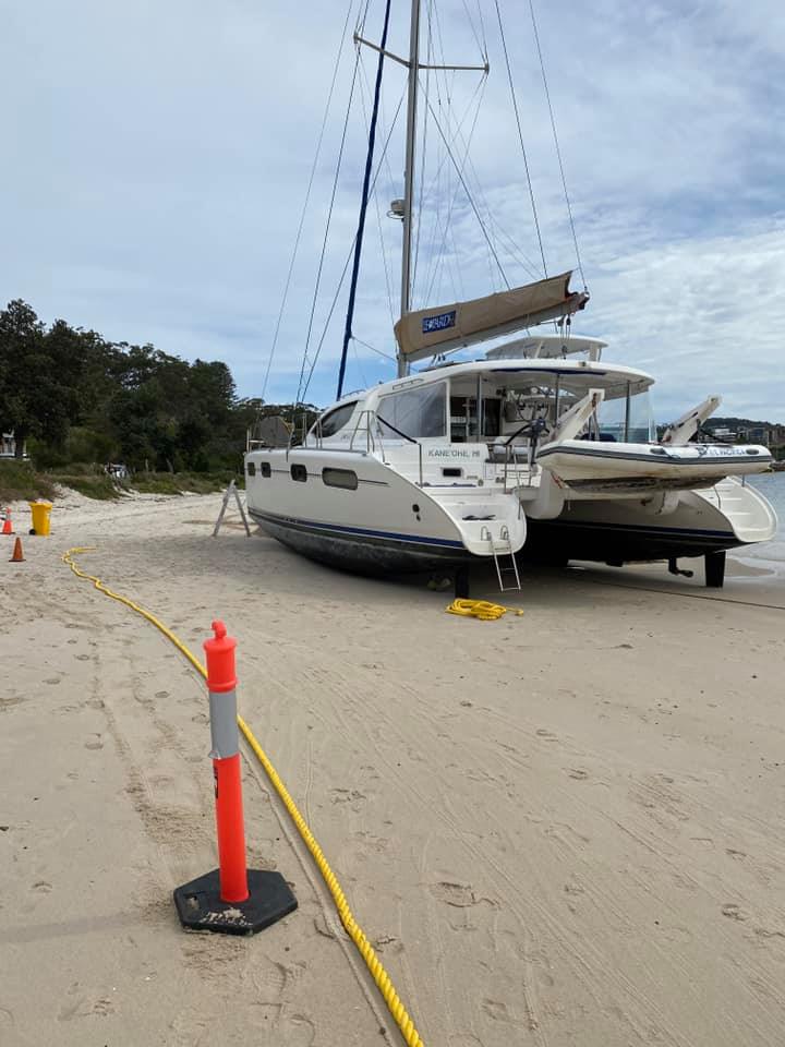 Boat Pulled Up on the Beach for Repair — M&J Marine Services in Medowie, NSW