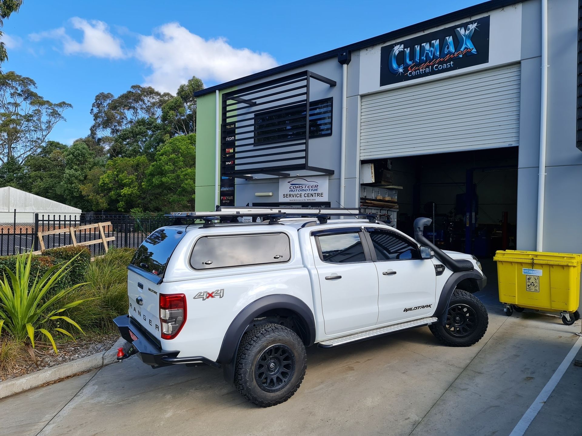 A White Truck With the Word Climax on the Side — Coasteer Automotive In Tuggerah, NSW
