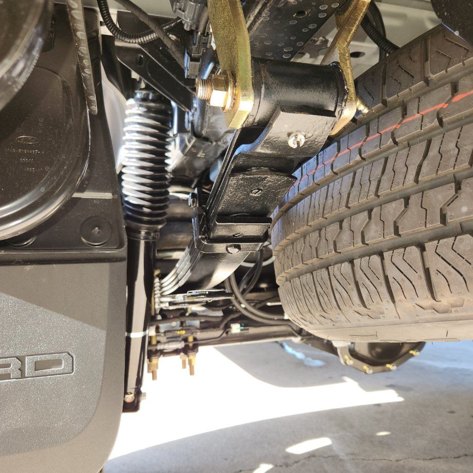 A Close Up of a Car's Suspension and Tire — Coasteer Automotive In Tuggerah, NSW